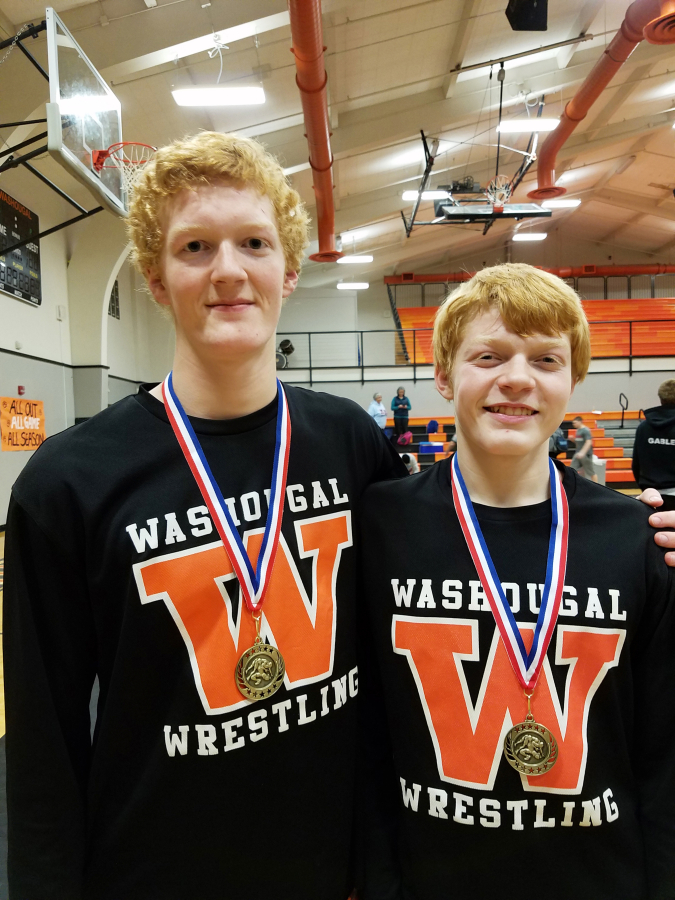 Brothers Tanner and Scott Lees won Washougal River Rumble championship medals Dec. 29, at Washougal High School.