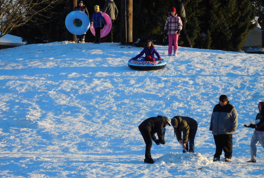 Local kids enjoyed sledding on this hilll near the Washougal River Greenway Trail. With temperatures in the 20s all week, the snow became packed down and perfect for sledding. (Danielle Frost/Post-Record)
