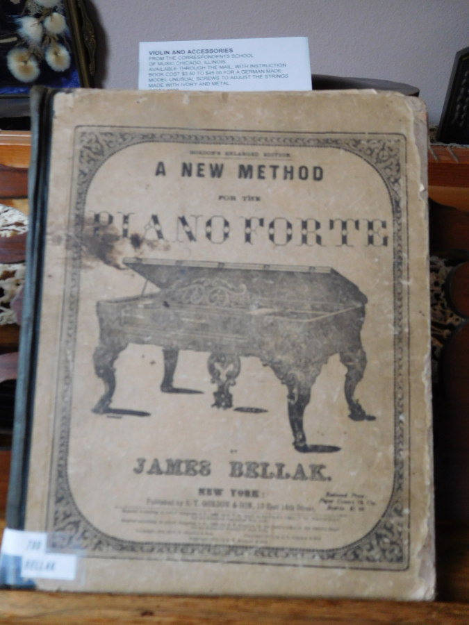 The Two Rivers Heritage Museum includes a plethora of historical artifacts, including this turn-of-the-century music book, which sits on top a 1886 Arion Square grand piano.