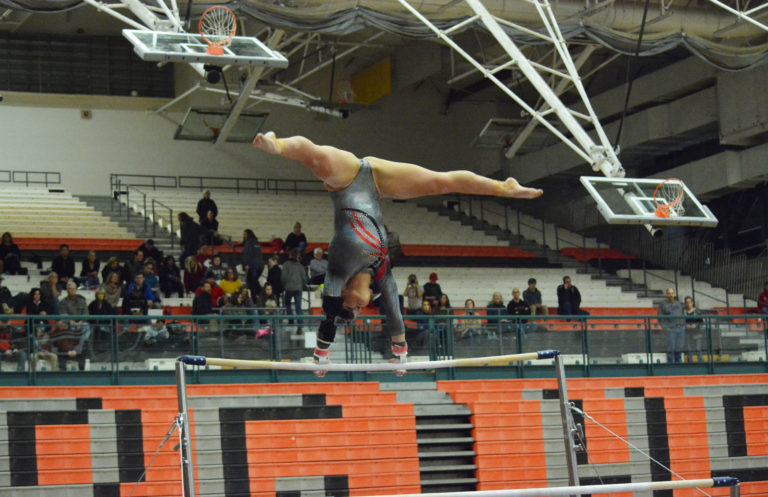 District all-around champion Alexa Dietz delivered an 8.7 for Camas on the bars.