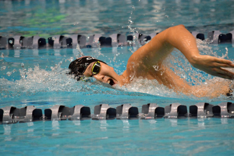 Mark Kim defended his state titles in the 200 and 500 freestyle races.