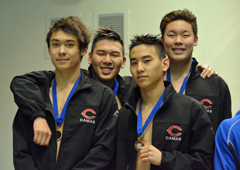 Tom Utas, Mark Kim, Jaden Kim and Eric Wu won the 200 freestyle relay state championship for Camas.