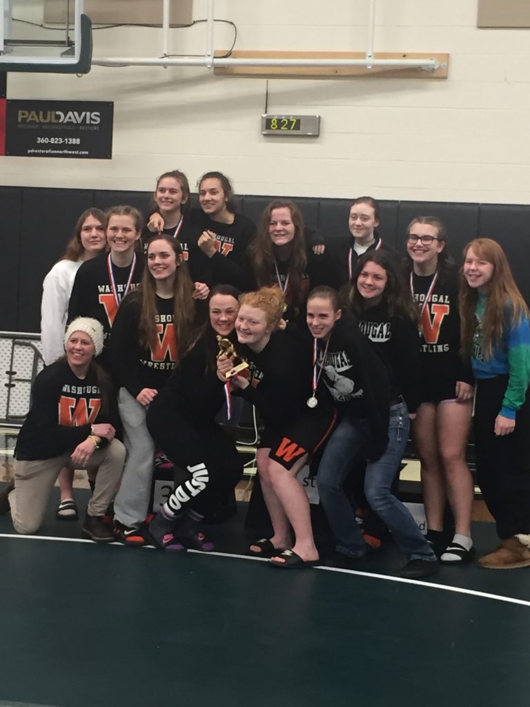 The Washougal girls wrestling team on the district championship Saturday, at Woodland High School. The Panthers earned 276.5 points to win the 20-school tournament by 140.5 points (contributed photo).