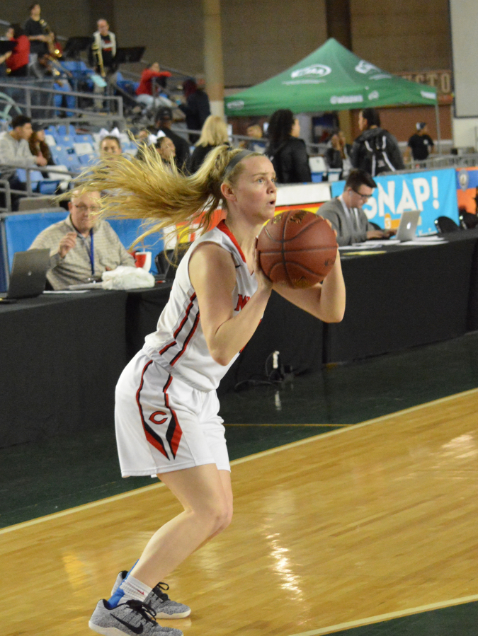 Haley Hanson takes a 3-point shot for the Papermakers.