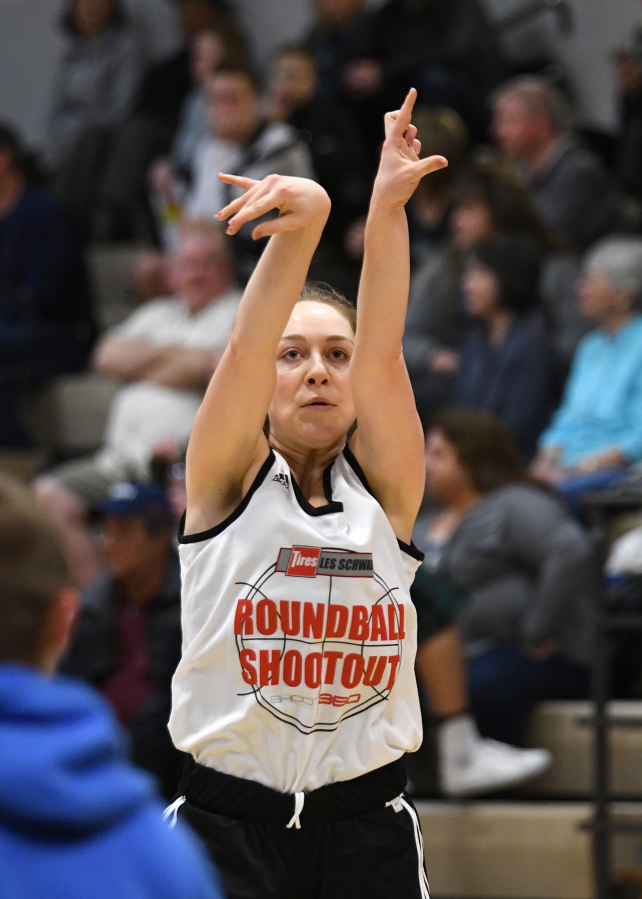 Camas High School senior Teague Schroeder made 14 threes in a minute to win the girls 3-point contest.