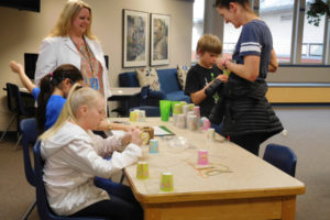 Gause Elementary third-grade teacher Heidi Kleser led the "Science of Sound" activity during family science night recently. She enjoys helping students develop a deeper understanding of the content taught in school, in a fun way. 