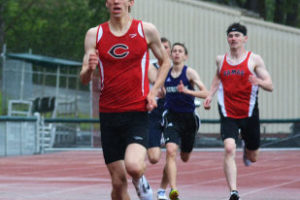 Daniel Maton sprints to the finish line in first place. The Camas High School junior clinched district titles in the 1,600- and 800-meter races May 10 and 11, at McKenzie Stadium, in Vancouver. He also helped the Papermakers win the 1,600 relay. 