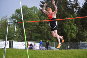 Washougal High School junior Tanner Lees completes his first and only vault at the 2A sub-district meet before the rain washed out the event May 12, in Ridgefield. He tied for the lead with a leap of 11 feet. 