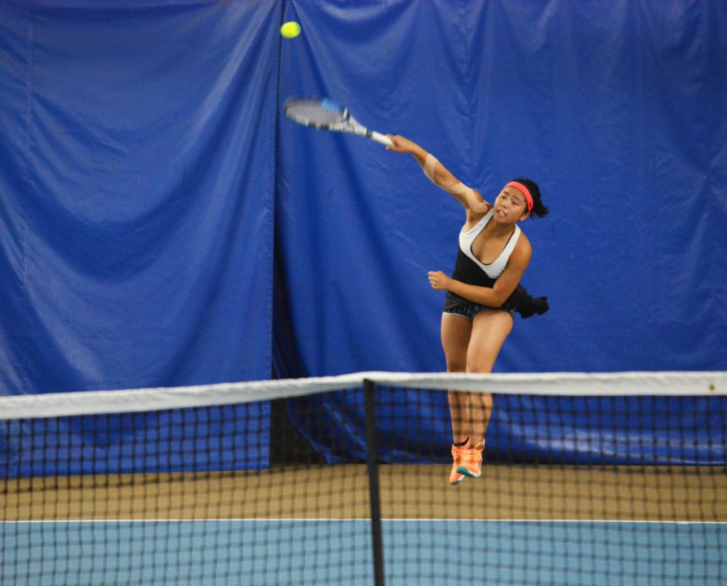 Hannah Gianan serves in the first set of the 4A state championship tennis match for Camas High School Saturday, at the Columbia Basin Center in Richland. She wrapped up her Papermaker career with another second place finish.