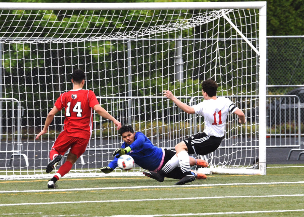Danny Wing kicks in the first goal for the Papermakers in the second minute of the game. Photo by Kris Cavin.