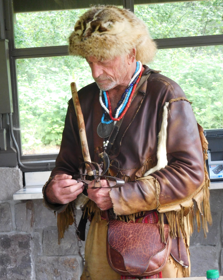 Wendlick demonstrates how a beaver trap was set during pioneer days.