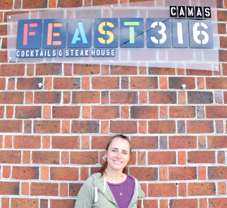 Co-owner Melissa McCusker stands outside of her business, Feast 316 in downtown Camas.