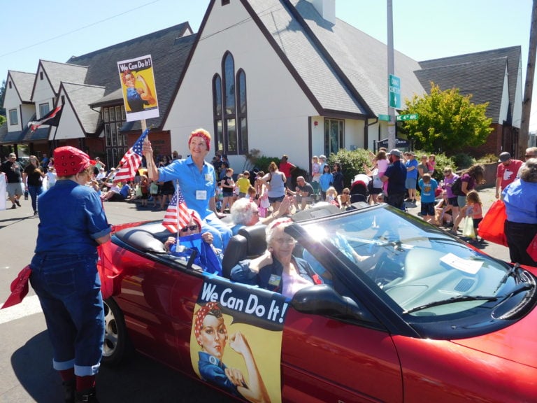 Members of Soroptimist International of Camas-Washougal paid homage to "Rosie, the Riveter," in the Camas Days Grand Parade, Saturday, July 22, 2017. (Post-Record files)