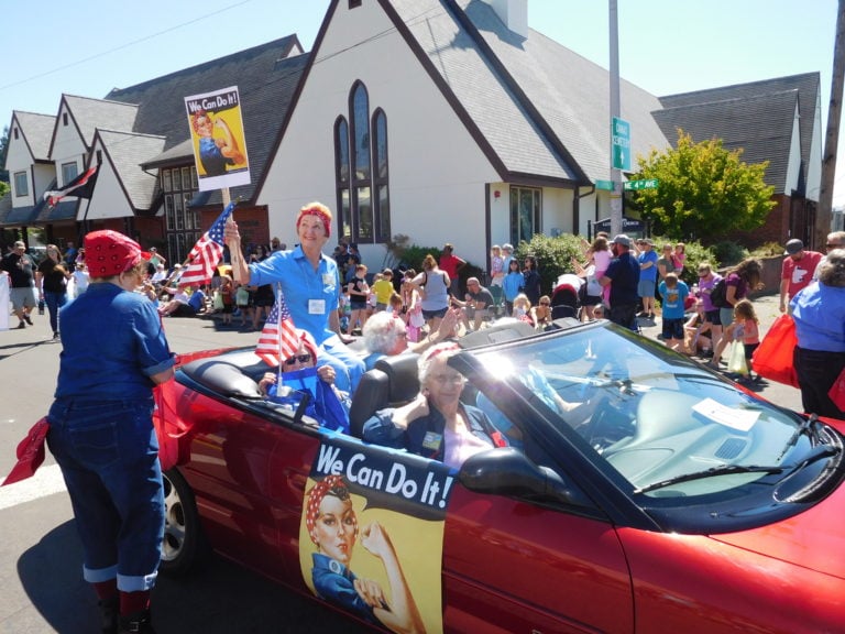 Members of Soroptimist International of Camas-Washougal paid homage to "Rosie, the Riveter," in the Camas Days Grand Parade, Saturday, July 22, 2017. (Post-Record files)

