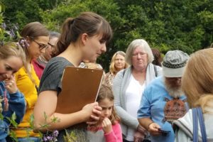 Instructor Eve Hanlin takes foraging class participants on a hike at Columbia Springs to show them edible and non-edible plants.