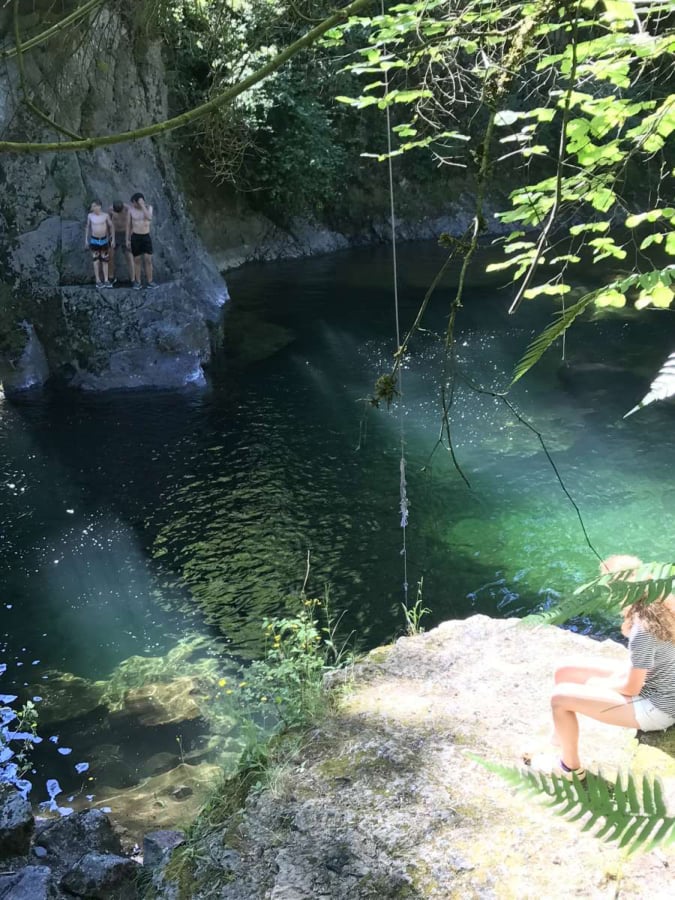 Two boys recently cooled off in the Washougal River, near Naked Falls.