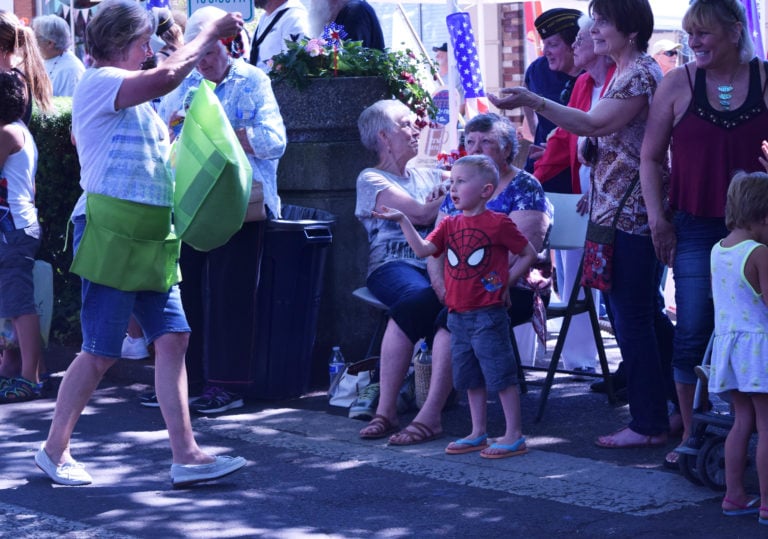 Camas parade participants handed out sweet treats to the crowd on Saturday.  
