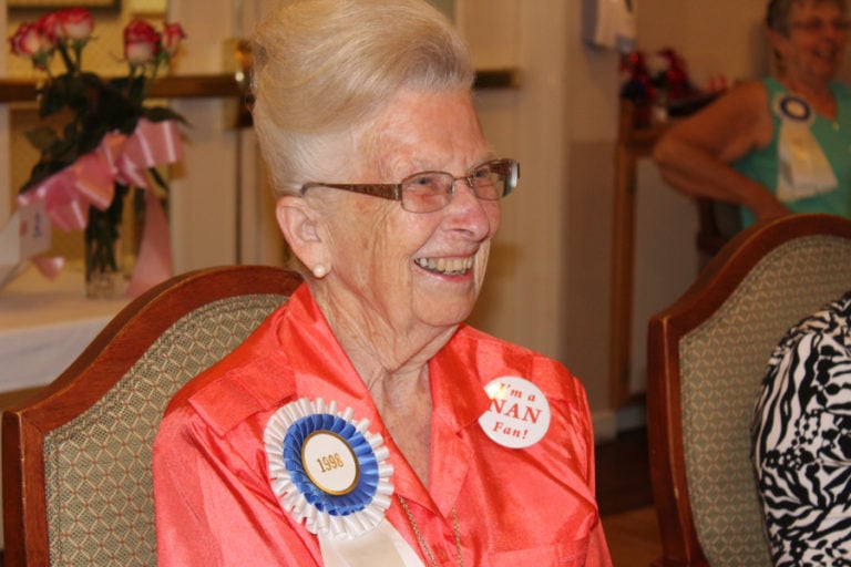 1998 Camas Days Royal Court Queen Virginia Warren, with her &quot;Nan Fan&quot; pin on, attends the 2017 Royal Coronation.