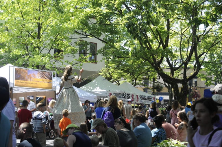 A stiltwalker was one of the many attractions of the Camas Days Children's Parade.