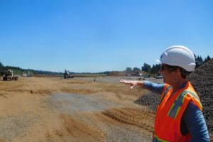 Kathy Carlson, project manager for the new Lacamas Lake Elementary School site, describes how the building will be sitiuated to take advantage of views of Mount Hood. Construction will be complete next summer.