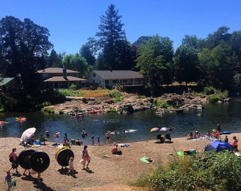 Crowds cool off at the Sandy Swimming Hole in Washougal in July 2017. The National Weather Service has issued an excessive heat warning that will be in effect Saturday through Monday, June 26-28.