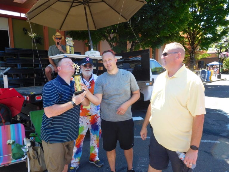 "Cool Runnings," a trio of men who know each other through their sons' flag football team, "The Texans," placed third in the Camas Days bathtub races. "Cool Runnings" features Brad Ault, Brian Fischer and Dan Babb (left to right).