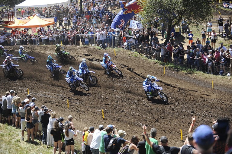 Aaron Plessinger (23) leads the 250 class up Horsepower Hill during the opening race Saturday, at Washougal Motocross Park.