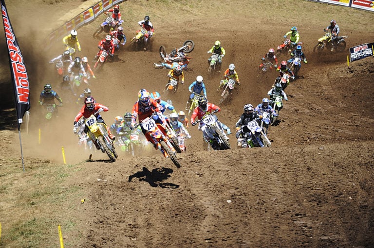 Marvin Musquin takes the lead out of the holeshot in the 450 class Saturday, at Washougal Motocross Park. The back of the pack scrambles to avoid a racer who tumbled over.