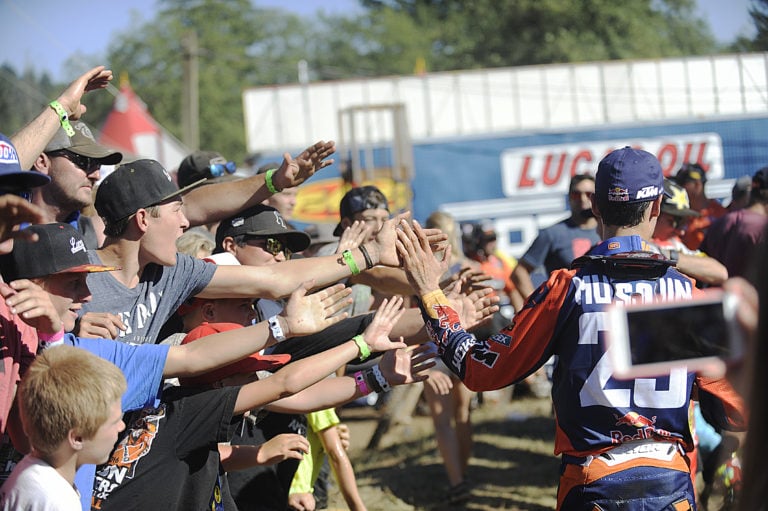 Washougal fans reach out to high five Marvin Musquin.