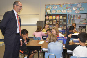 Washougal School District Superintendent Mike Stromme greets students on the first day of the 2016-17 school year. (Post-Record file photo)