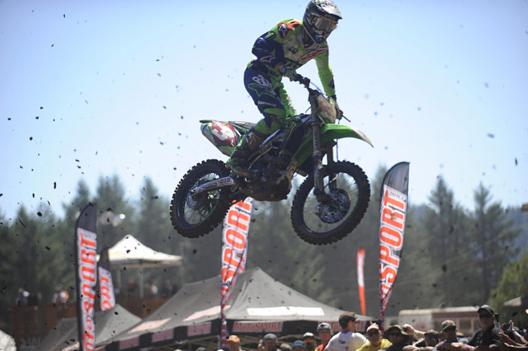 Eli Tomac kicks up dirt as he soars above the crowd at Washougal Motocross Park Saturday.
