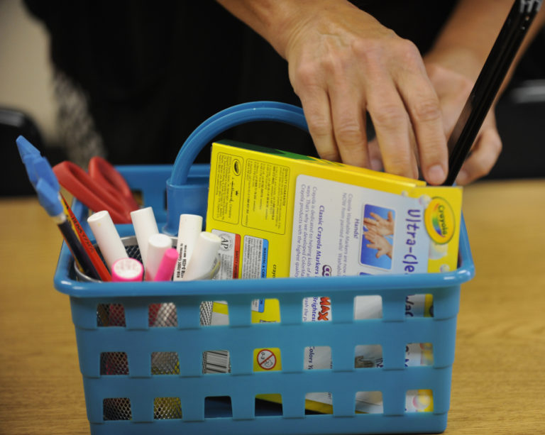 Cindy Gregory arranges supplies in her lifeskills classroom at WHS.