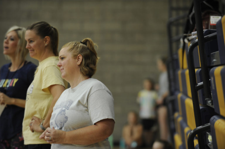 Katie Hofsess listens to Jemtegaard Middle School volleyball players during an icebreaker activity on the first day of practice Monday.