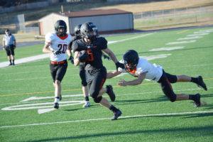 Kade Coons sprints to the end zone for one of his two touchdowns during the Washougal Black and Orange scrimmage game Aug. 25, at Fishback Stadium. The Panthers kick off a new season Friday, at West Seattle High School. The game begins at 7 p.m. 