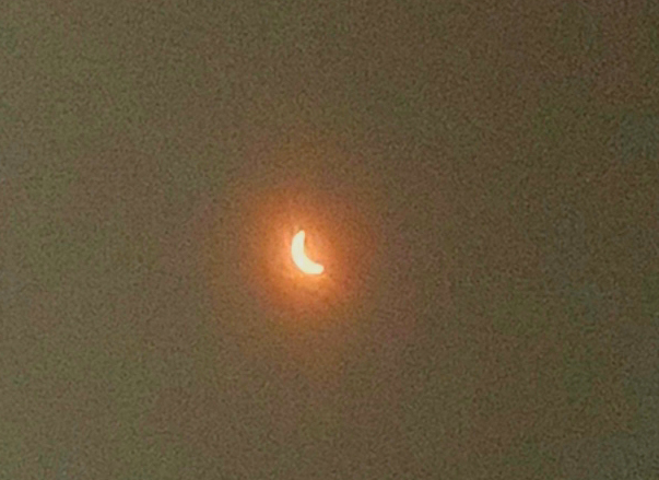 Covering a Smart phone with approved eclipse viewing glasses was an effective way to capture shots of the event as the moon began to cover the sun, creating the first total eclipse since 1979. 