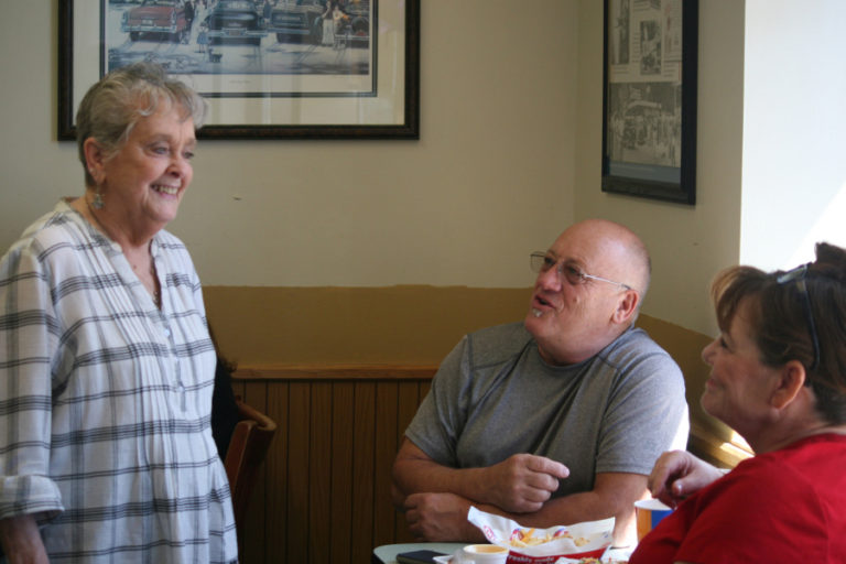 Wilma &quot;Willi&quot; McOmie (left) greets Mike and Jill Watts, of Washougal, at the Camas Dairy Queen on Aug. 25. McOmie, 80, has owned the restaurant for 37 years and plans to retire by the end of this year. Mike used to do some plumbing work at the Dairy Queen, and he developed a friendship with Willi. &quot;She&#039;s just an awesome lady,&quot; he said.