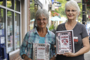 Dawn (Horn ) Coonrod (right) and Audrey (Ladd) Rancore, are two of the key organizers for the upcoming Camas High School class of 1965 reunion. They created these memory books to share with classmates.