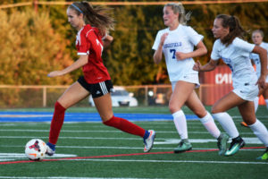 Jenna Efraimson brings the soccer ball up the field for the Camas Papermakers Saturday, at Ridgefield High School. She scored two goals in the first eight minutes of the game to help the Papermakers beat the Spudders 7-1. 