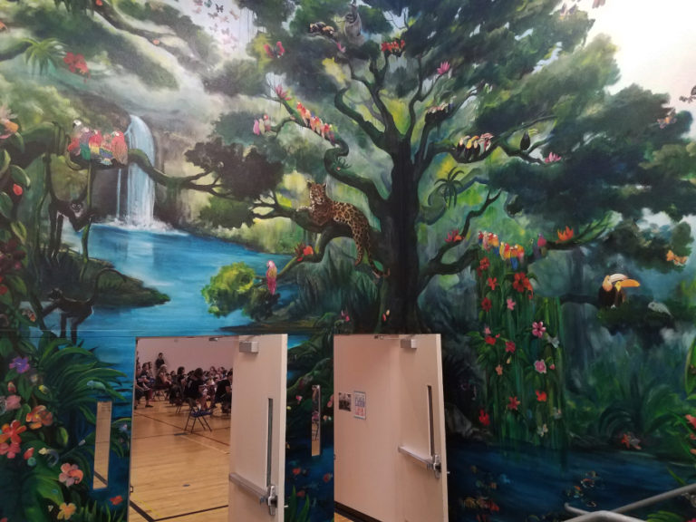 This mural frames the gym and cafeteria at Prune Hill Elementary.