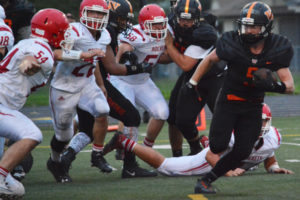 Kade Coons runs around the Rockets and scores a touchdown for Washougal Friday, at Fishback Stadium. Coons collected 105 rushing yards and three touchdowns to help the Panthers defeat Castle Rock 41-14. 