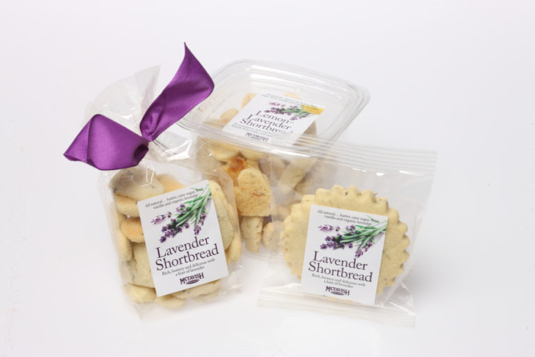 McTavish Shortbread workers fold natural ingredients into the small-batch shortbread to produce unique flavors like the lavender cookies pictured here.