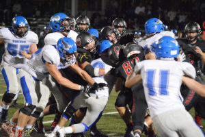 Camas High School defenders swarm Coeur d'Alene quarterback Colson Yankoff Friday, at Doc Harris Stadium. The Papermakers rallied from 11 points down in the last two minutes of the game to defeat the Vikings 28-25. 