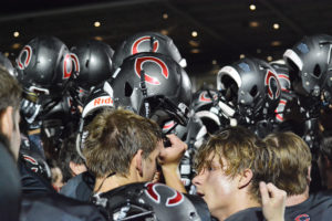 The Camas High School football players celebrate a thrilling 28-25 come-from-behind victory against Coeur d'Alene, Idaho, Friday, at Doc Harris Stadium. The Papermakers rallied from 11 points down in the final two minutes of the game. They have won 54 regular season games in a row since a non-league loss in 2011.