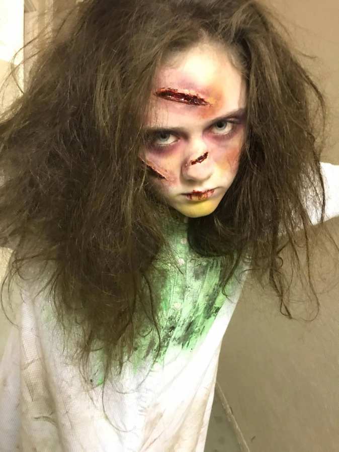 Kaia King portrayed the character of Regan, from The Exorcist, in &quot;Villains &amp; Vixens,&quot; a Halloween Cabaret at The Headwaters Theater in Portland. Miranda Straub (not pictured), of Camas, provided makeup services for some of the production&#039;s crew members, actors and actresses, including King.