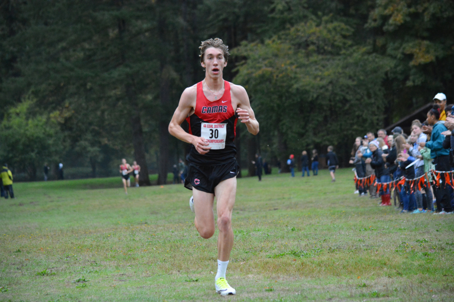 Daniel Maton clinched the 4A boys district cross country championship for Camas Oct. 18, at Lewisville Park in Battle Ground. He finished with a time of 16:10. The Papermakers swept the top four places to secure the team title. 