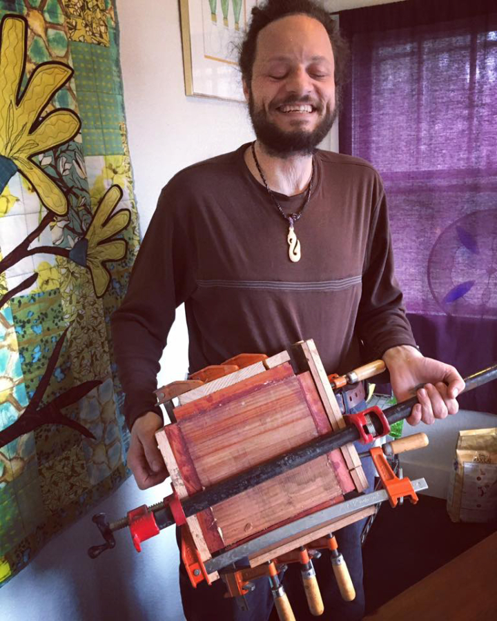 Washougal artist John Furniss works in his woodworking studio in 2017.