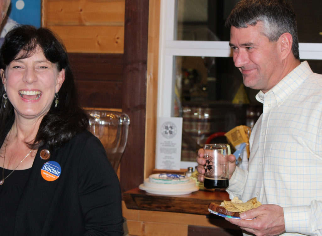 Washougal School Board candidate Donna Sinclair (left) and Port of Camas-Washougal Commissioner John Spencer (right) celebrate at 54° 40’ Brewing on Tuesday. Sinclair and Spencer both won their races in the Nov. 7, 2017 General Election. Photo by Kelly Moyer/Post-Record
