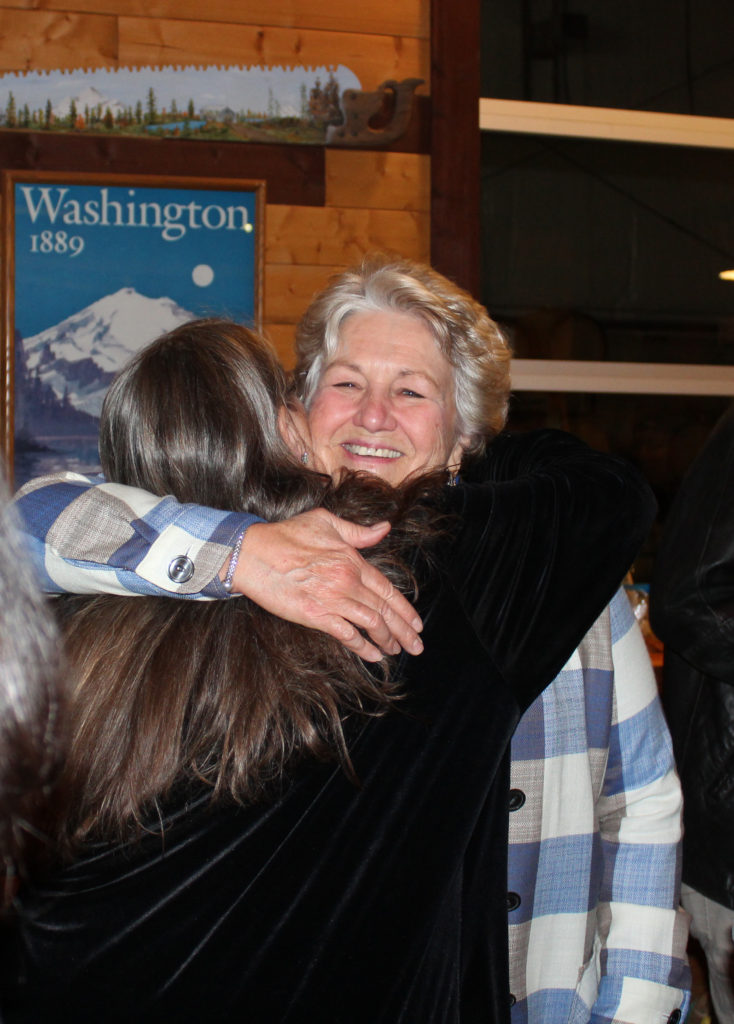 Molly Coston (left) gets a hug from a supporter after election results came in Tuesday evening, Nov. 7, showing Coston has a lead in the Washougal mayoral race. Photo by Kelly Moyer/Post-Record