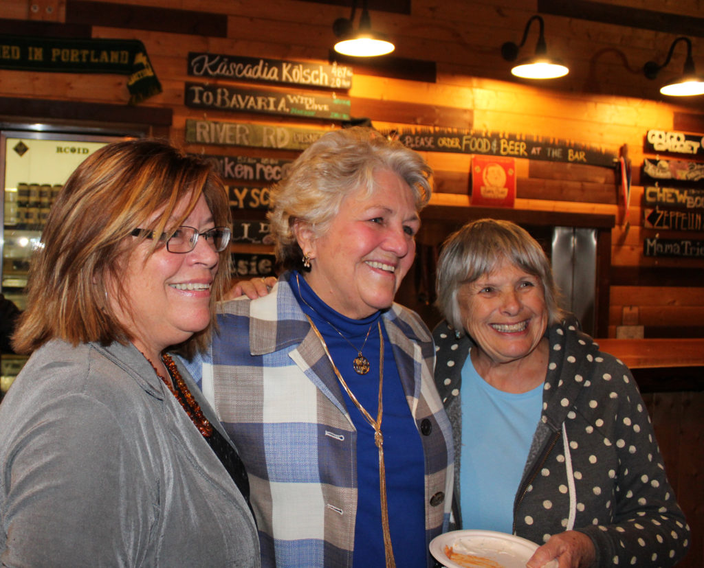 Washougal mayoral candidate Molly Coston (center) celebrates her election lead Tuesday with Washougal City Councilwoman Joyce Lindsay (right) and Cathy Morton (left) at 54° 40’ Brewing. Photo by Kelly Moyer/Post-Record