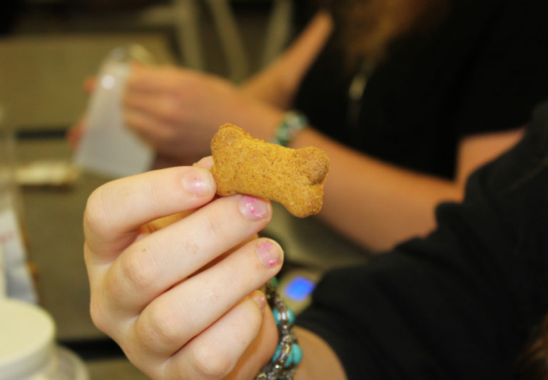 C.C. Bewick, 19, from Transition House, holds an example of the &quot;Puppermakers&quot; dog treats being crafted by Camas School District students and sold to raise money for the CSD&#039;s Transition House, which provides life skills to special needs students ages 18 to 21.